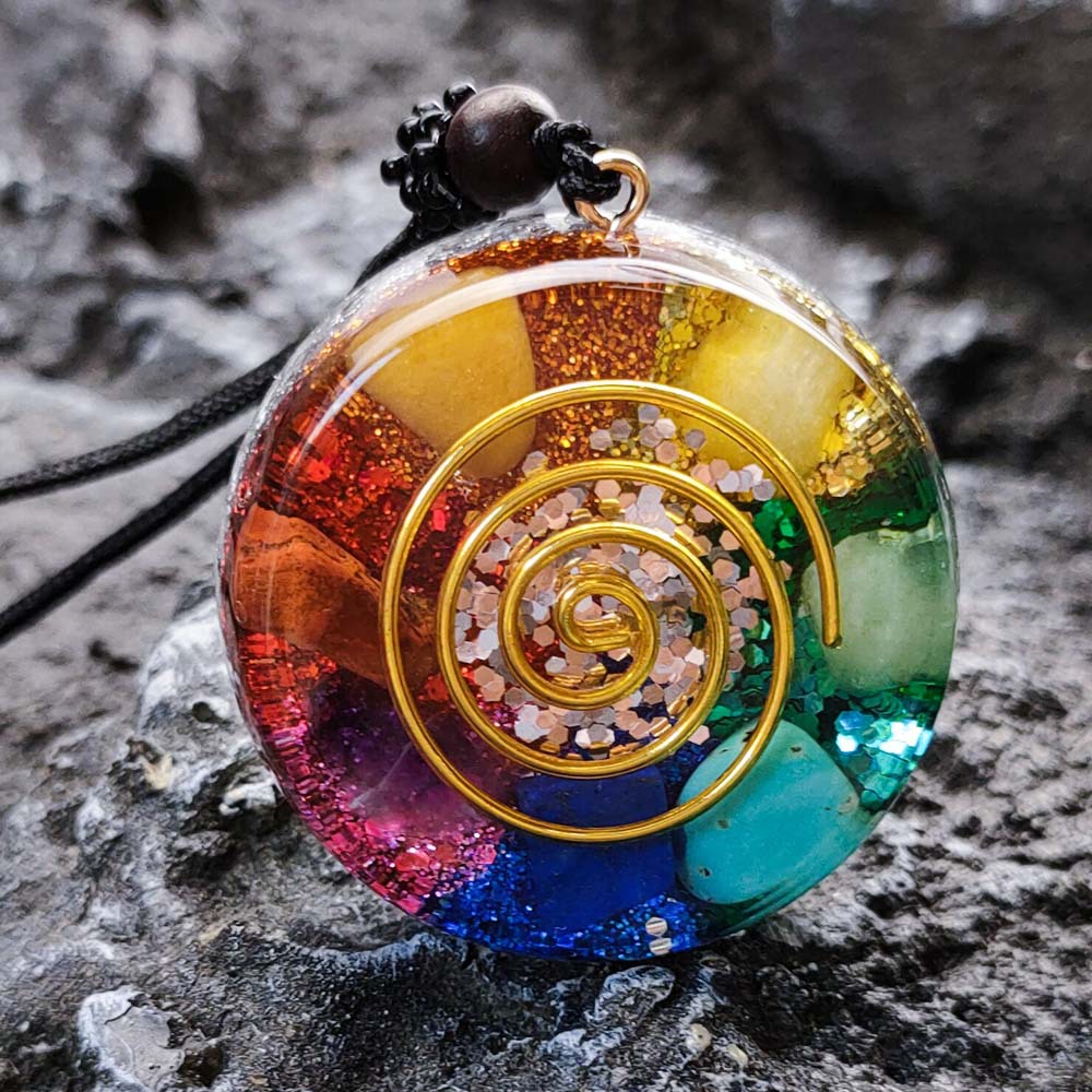 Colorful spiral pendant on a rocky surface