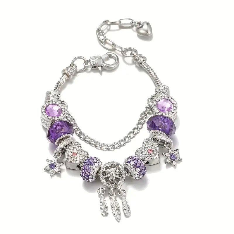 Silver bracelet with purple beads and charms on a white background