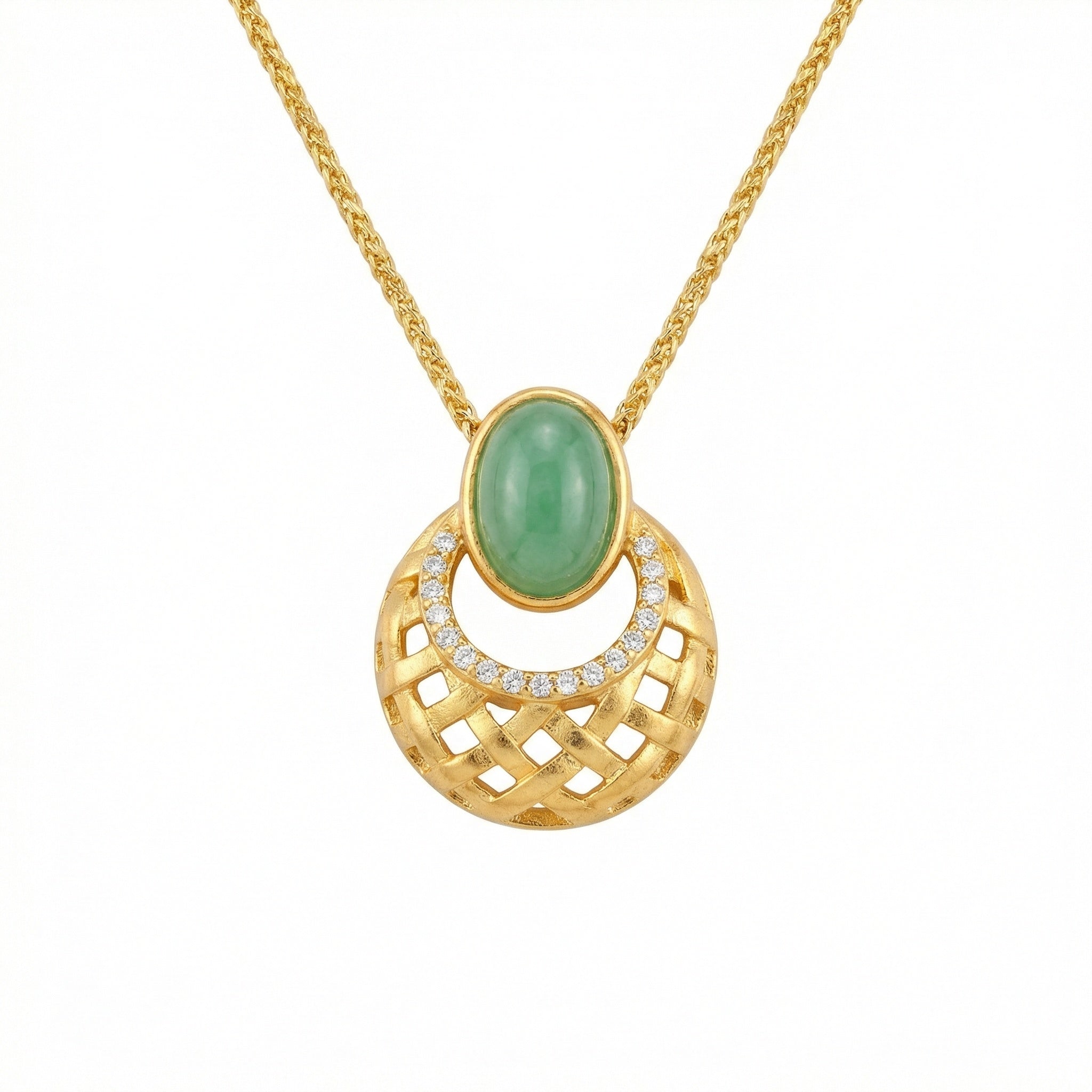 Gold necklace with a green gemstone pendant on a white background