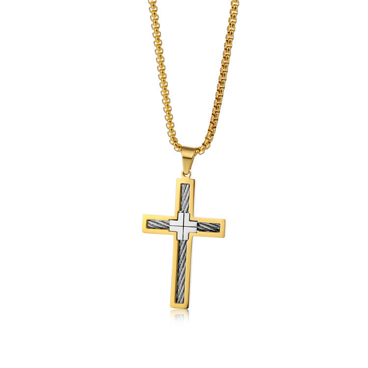 Gold and silver cross pendant necklace on a white background