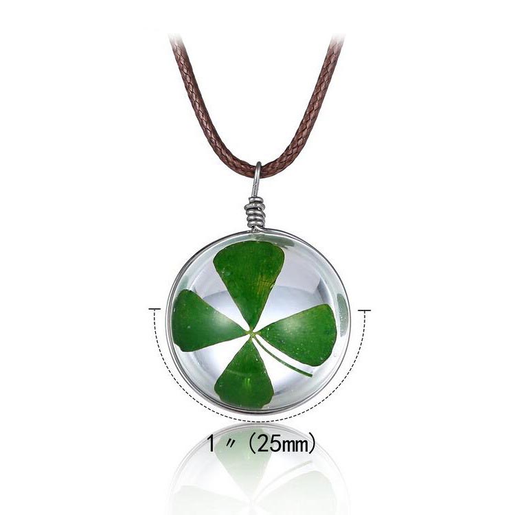 Four-leaf clover pendant necklace with measurement details on a white background