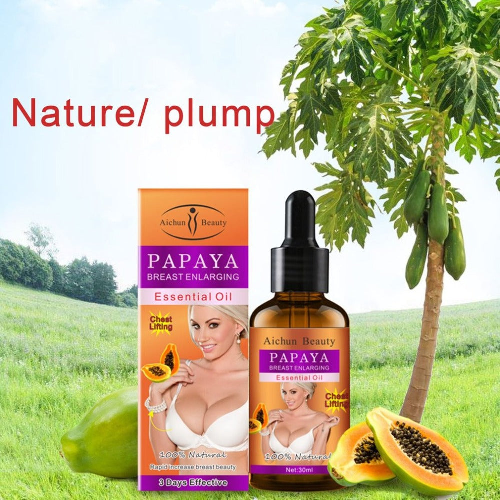 Papaya breast enlarging essential oil with packaging against a natural background
