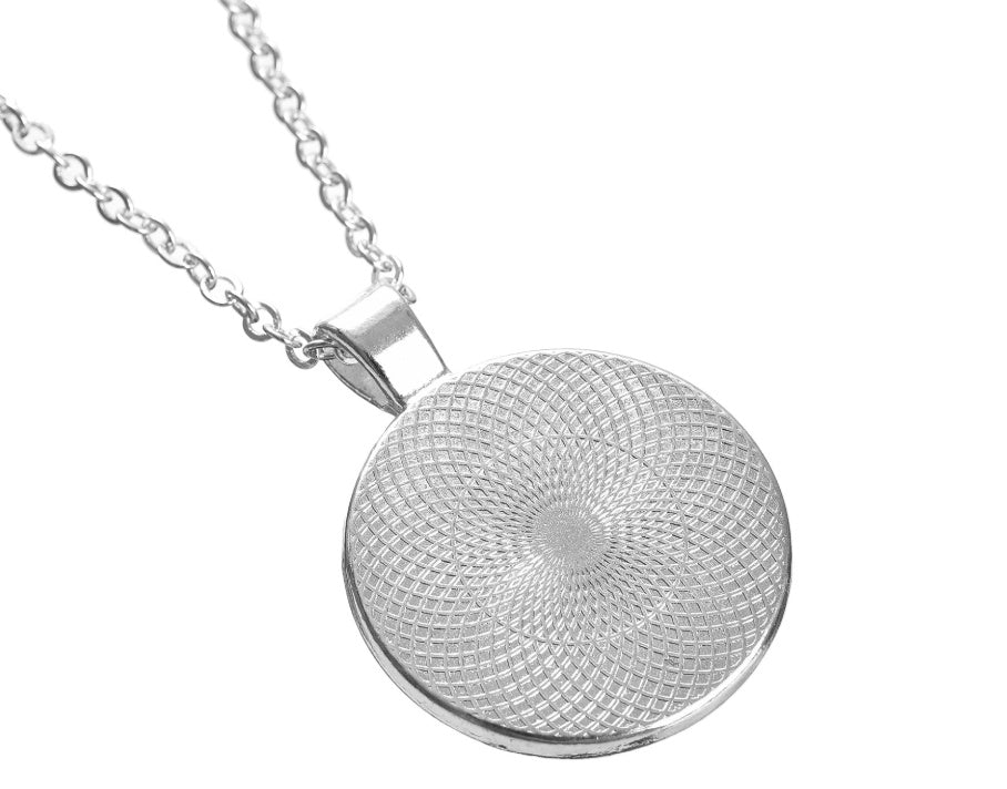Silver textured round pendant on a chain against a white background