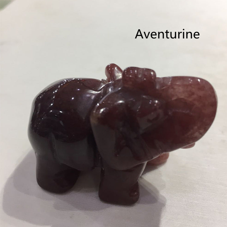 Carved aventurine stone elephant on a white background with 'Aventurine' text.