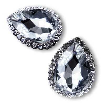 Pair of teardrop-shaped crystal earrings on a white background