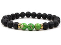 Black and green beaded bracelet on a white background