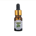 Bottle of Bergamot essential oil with dropper on a white background