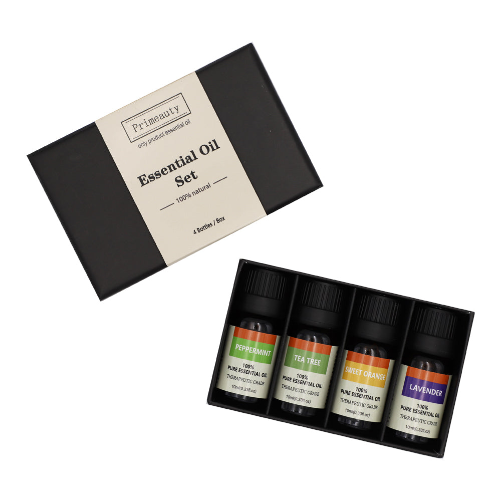 Set of four essential oil bottles in a black box with a branded label on a white background