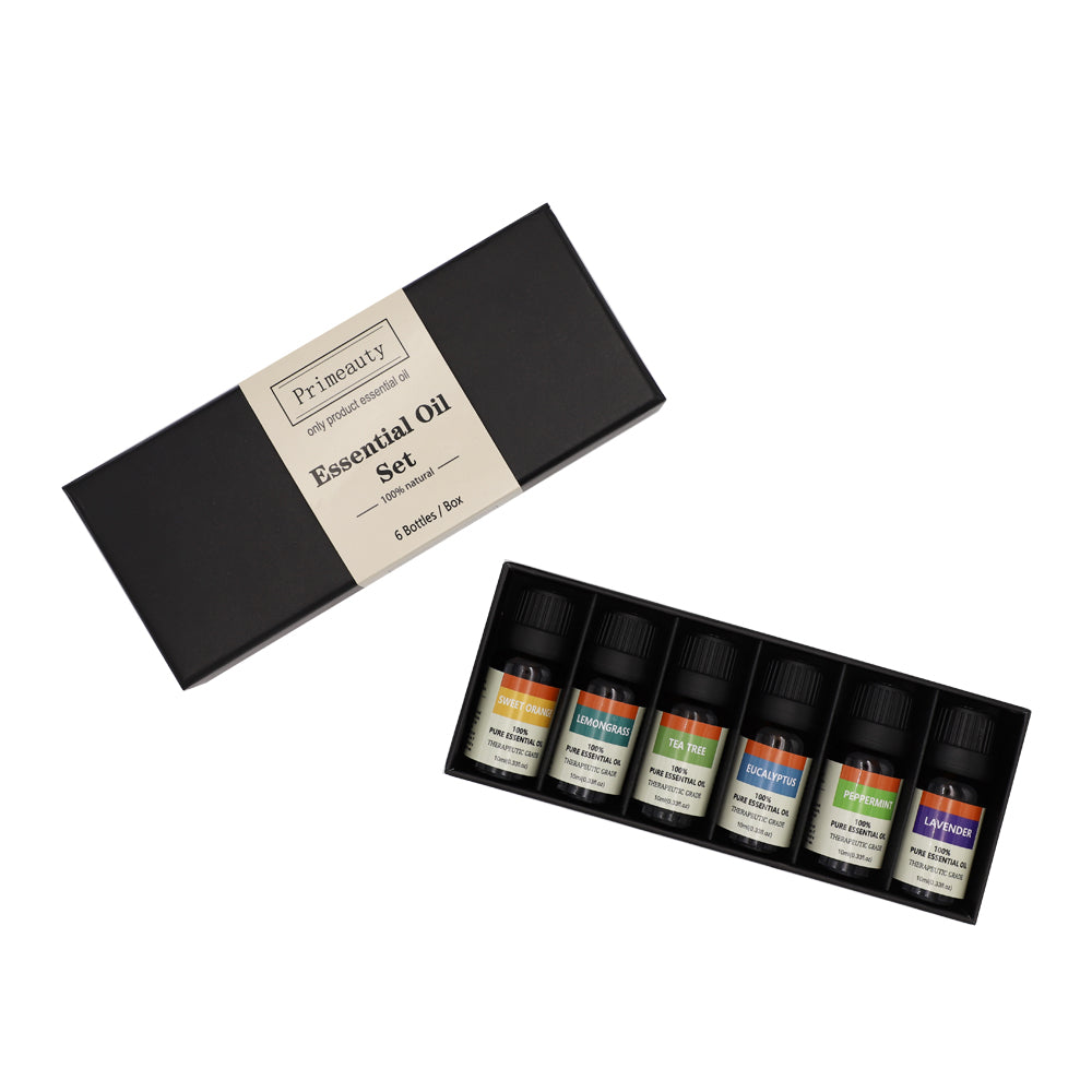 Set of six essential oil bottles in a black box with a branded label on a white background