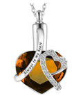 Silver necklace with heart-shaped pendant and 'Always in my heart' engraving on a white background