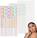 Woman with colorful makeup in front of a grid of multicolored dots