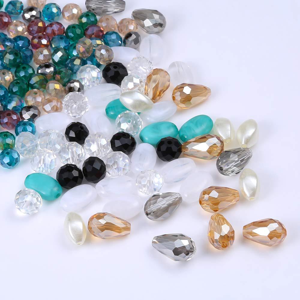 Assorted colored gemstones on a white background