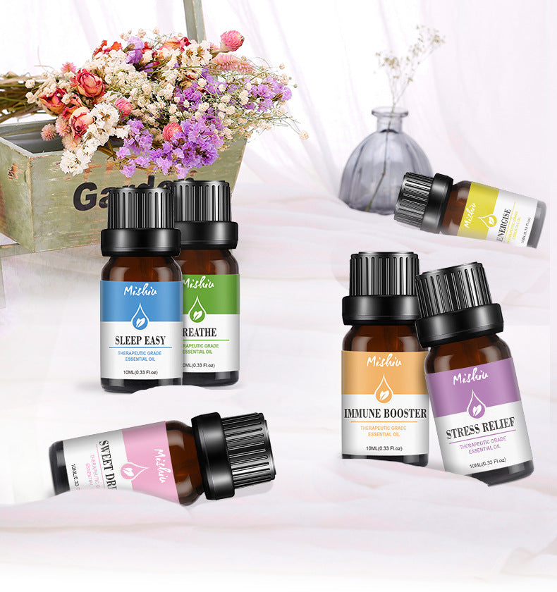 Collection of Mithun essential oil bottles with colorful labels on a white background.
