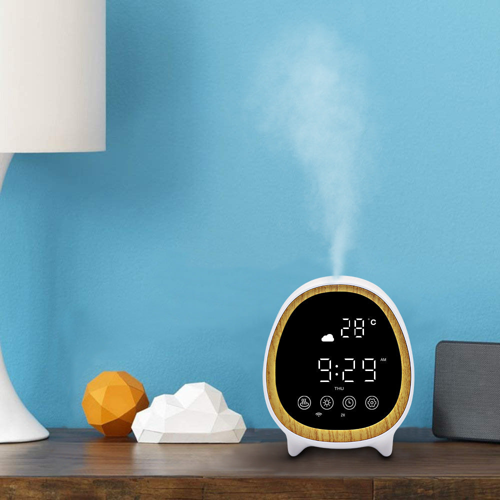 Digital clock with humidifier功能 on a wooden surface against a blue wall
