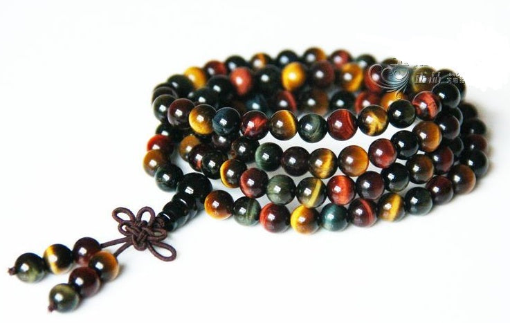 Multicolored beaded necklace on a white background