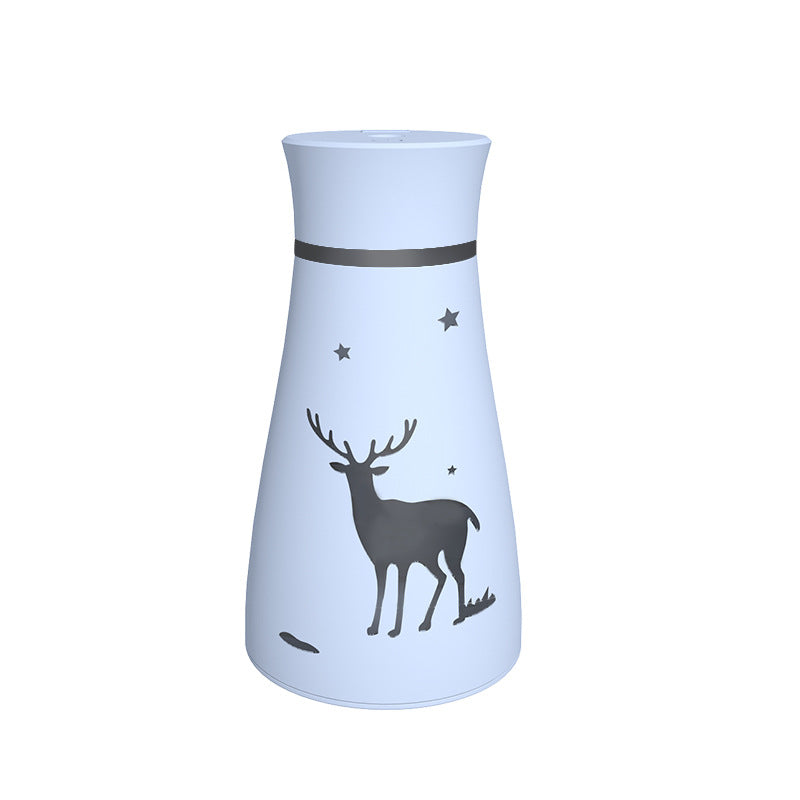 Light blue carafe with deer design on a white background