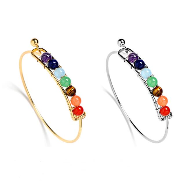 Two hoop earrings with colorful beads on a white background