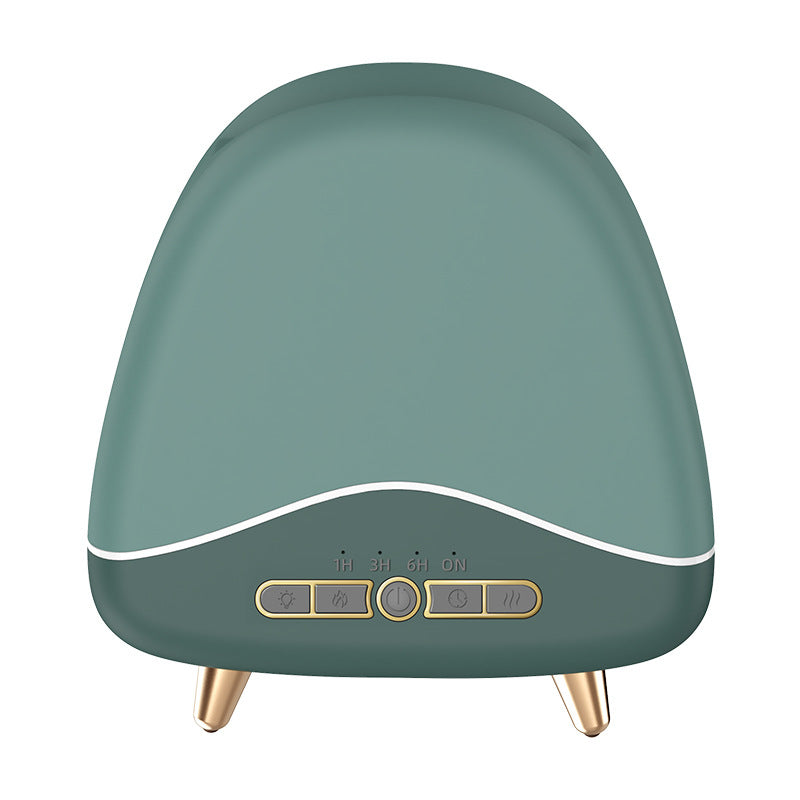 Green humidifier with gold accents on a white background