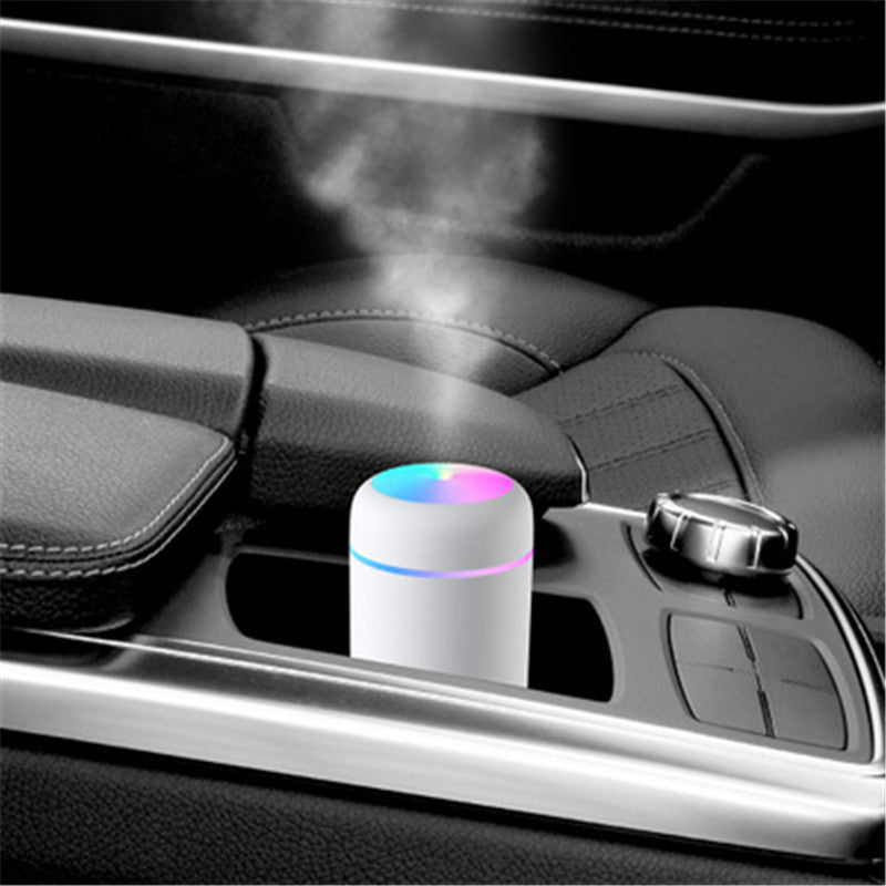 Car air freshener with colorful light in a car's cup holder
