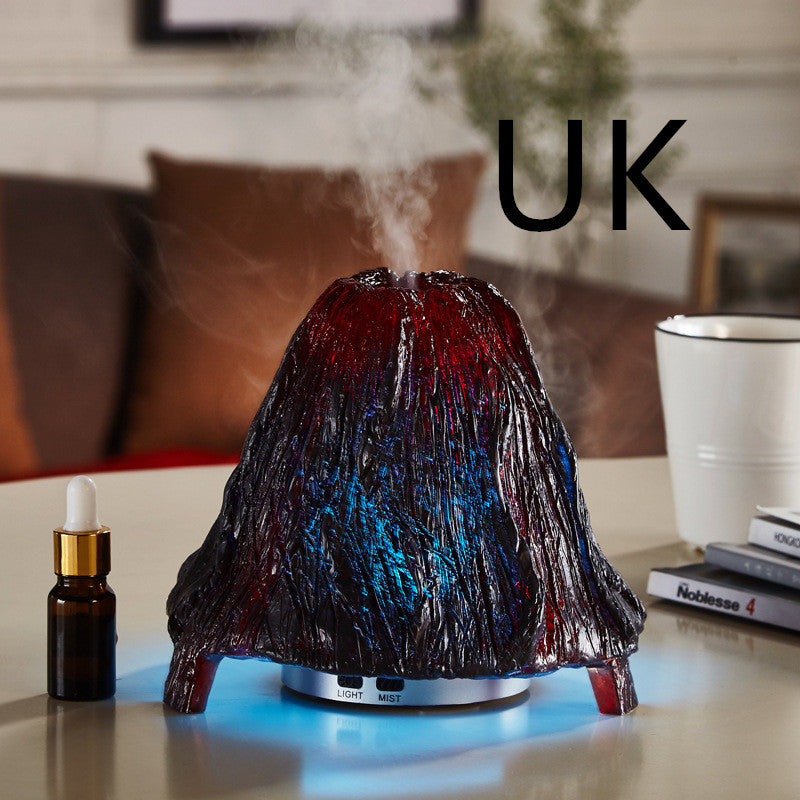 Decorative humidifier shaped like a volcano on a table with 'UK' text above.