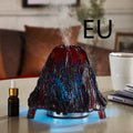 Decorative humidifier shaped like a volcano on a table with 'EU' text above.