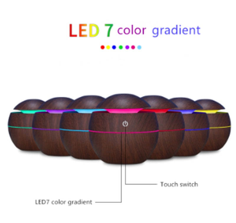 Wooden LED diffuser with 7 color gradient lights on a white background