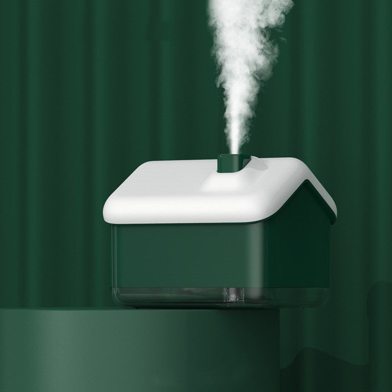 White humidifier emitting steam against a dark green curtain background