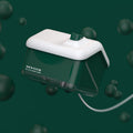 White electronic device with 'Snow House' branding on a green background
