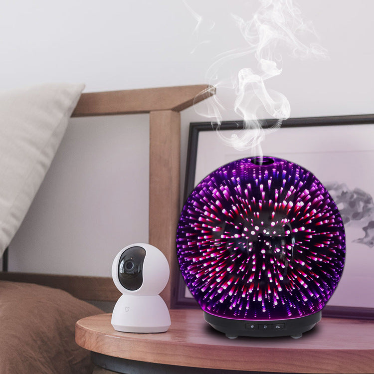 Smart home device and purple diffuser on a bedside table with a bed in the background