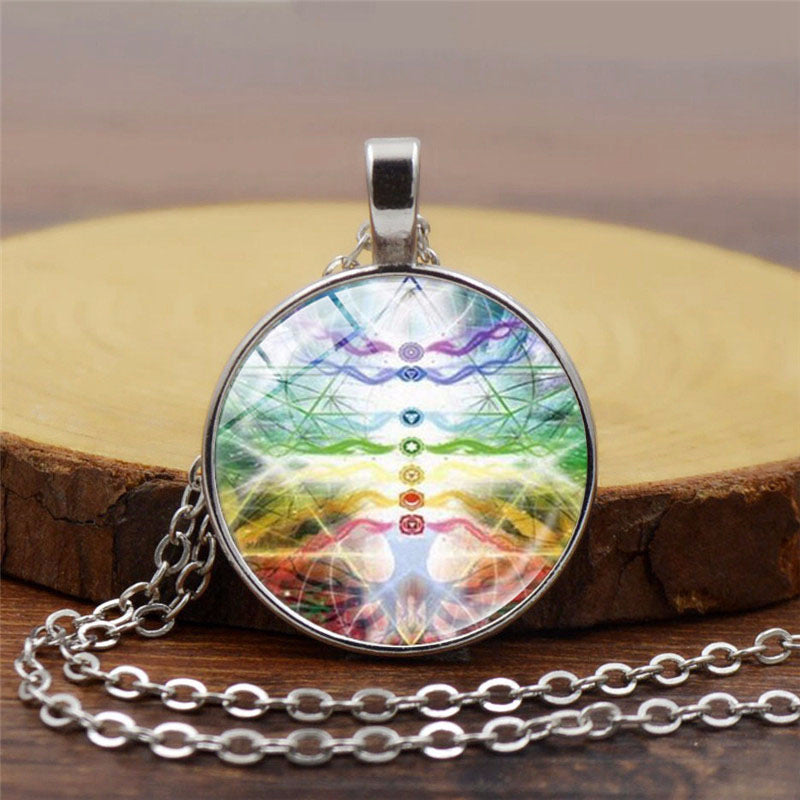 Necklace with a colorful pendant on a wooden surface
