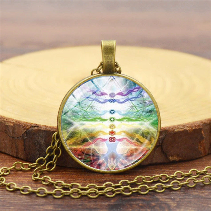 Necklace with a colorful pendant on a wooden surface