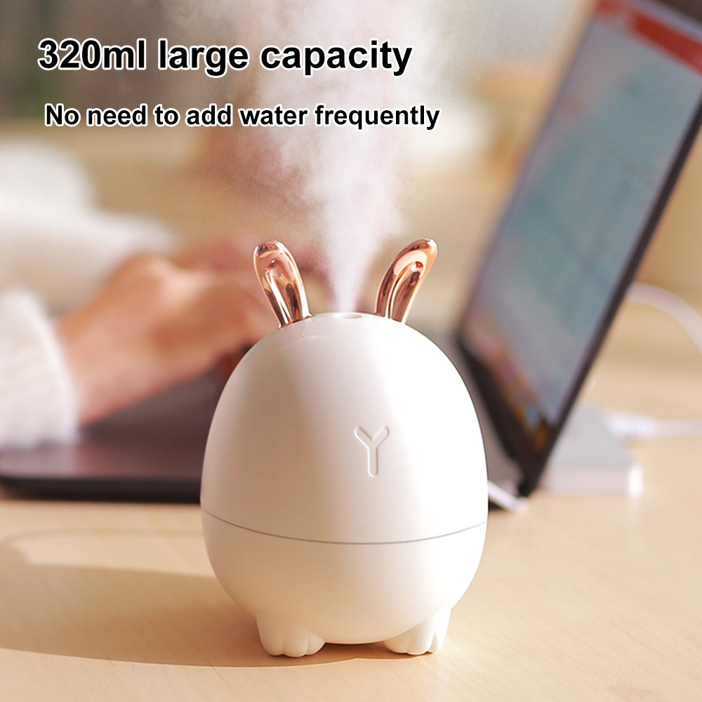 White rabbit-shaped humidifier on a desk with text about capacity and frequent water addition.