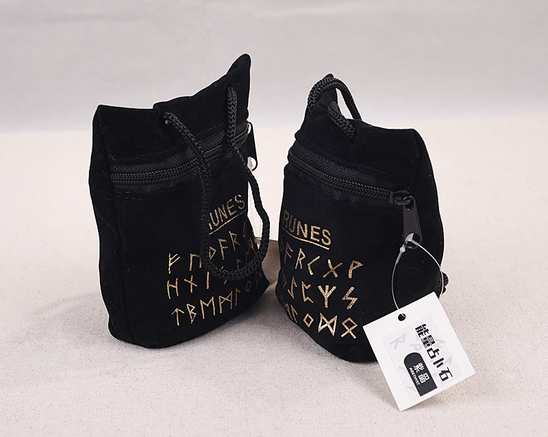 Two black bags with gold text on a light gray background