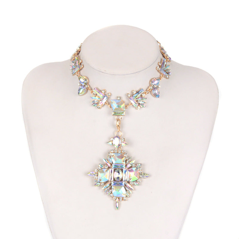 Elegant necklace with iridescent crystals on a mannequin against a white background
