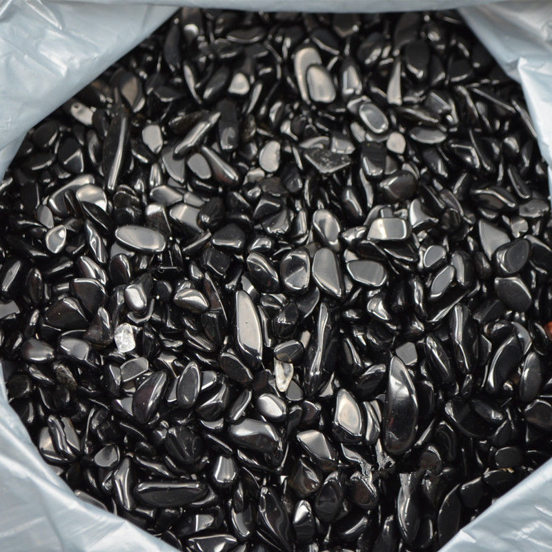 Bag of black pebbles or stones