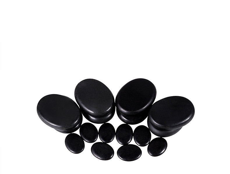 Set of black stones on a white background