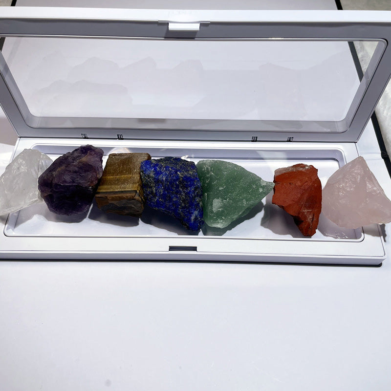 Set of colorful crystals in a white display case
