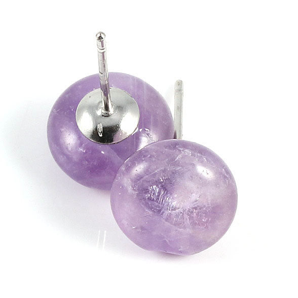 Purple round earrings with silver backs on a white background