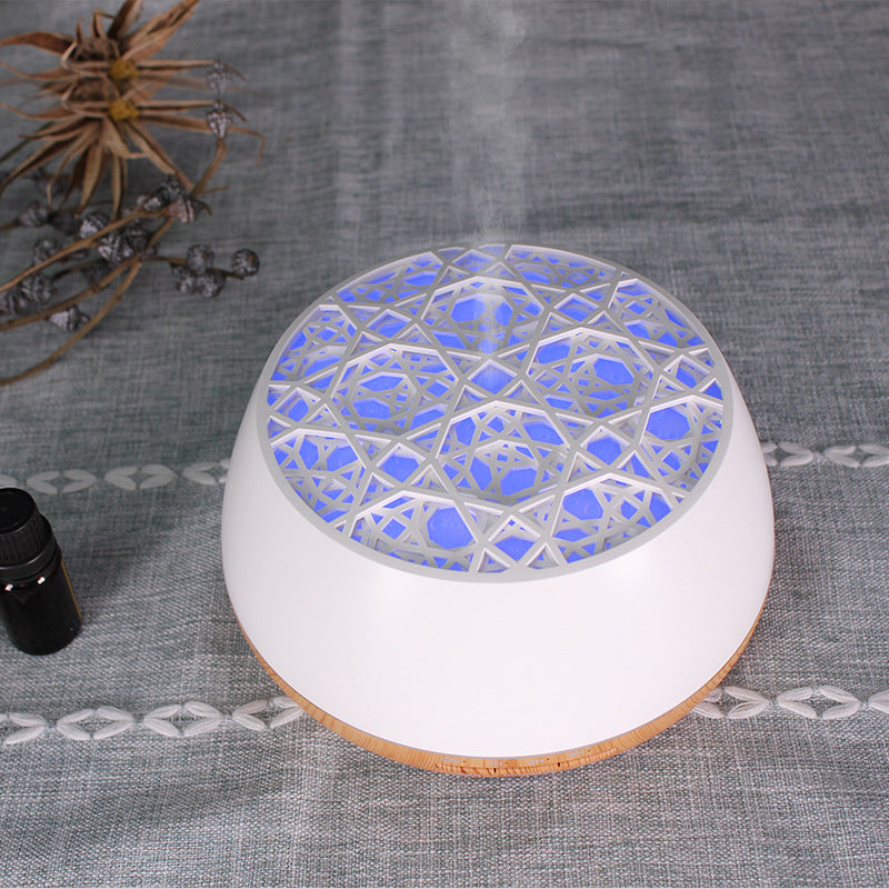 White diffuser with blue light on a textured surface