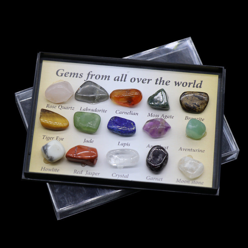 Collection of gemstones from around the world with labels on a display card.
