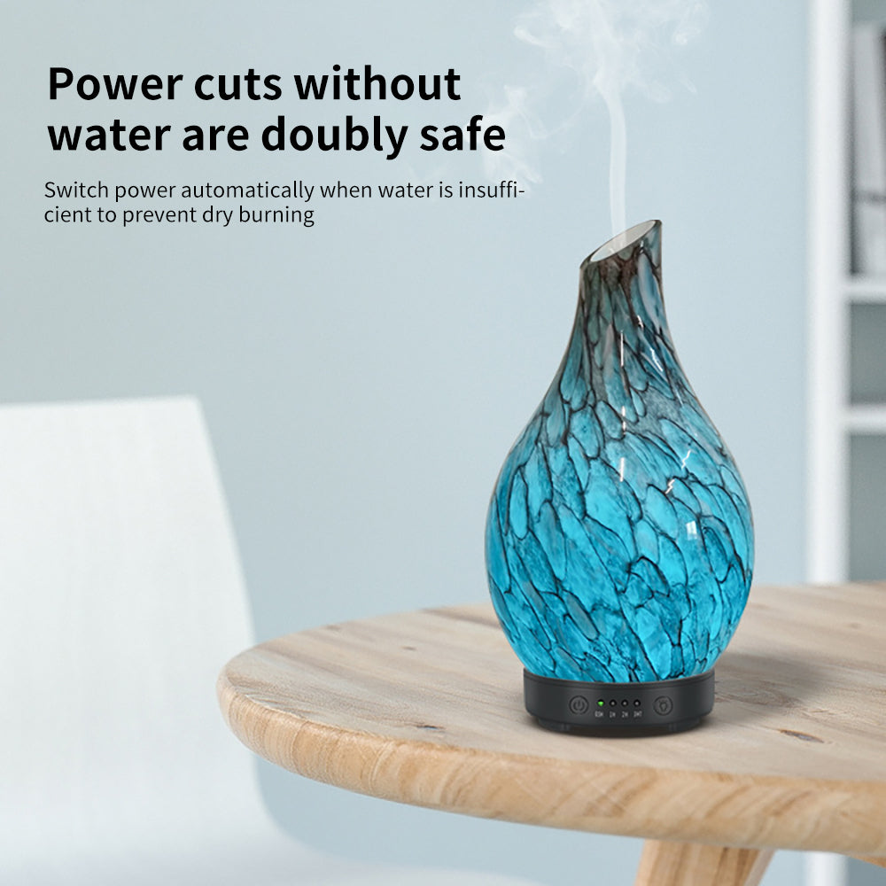 Blue diffuser on a wooden table with text about power cut safety.