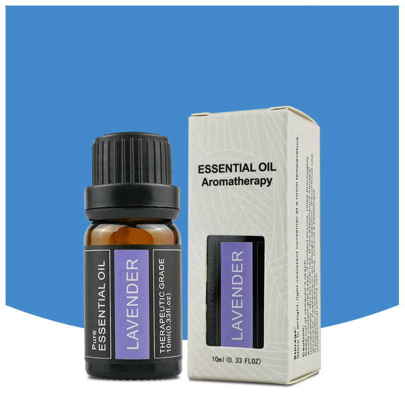 Lavender essential oil bottle and packaging on a blue background