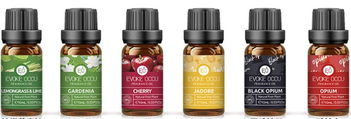 Set of Evolve Aromatics perfume bottles with various scents on a white background