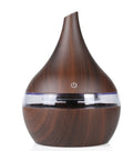 Wooden-textured diffuser with power symbol on a white background
