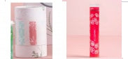 Product packaging with a floral design on a light pink background