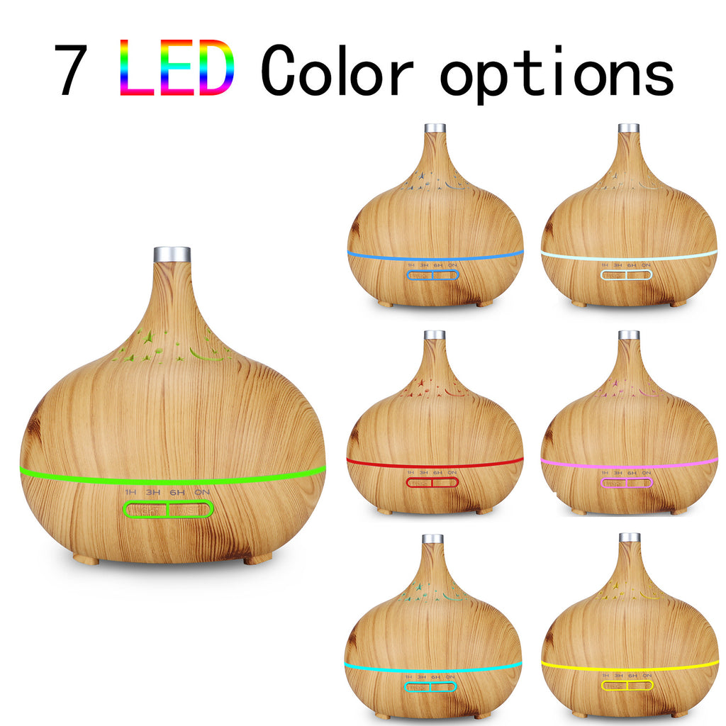 Wooden diffuser with 7 LED color options displayed on a white background