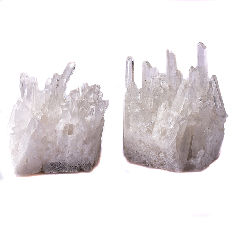 Two crystal formations on a white background
