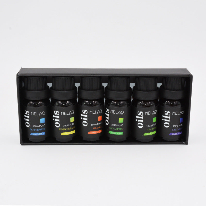 Set of Melao essential oil bottles in a black display box on a white background