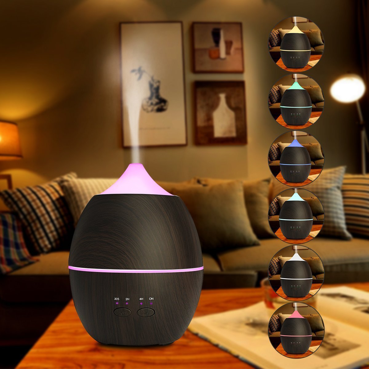 Black essential oil diffuser with purple light on a wooden table in a living room setting.