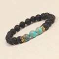 Bracelet with black beads and turquoise beads on a beige background